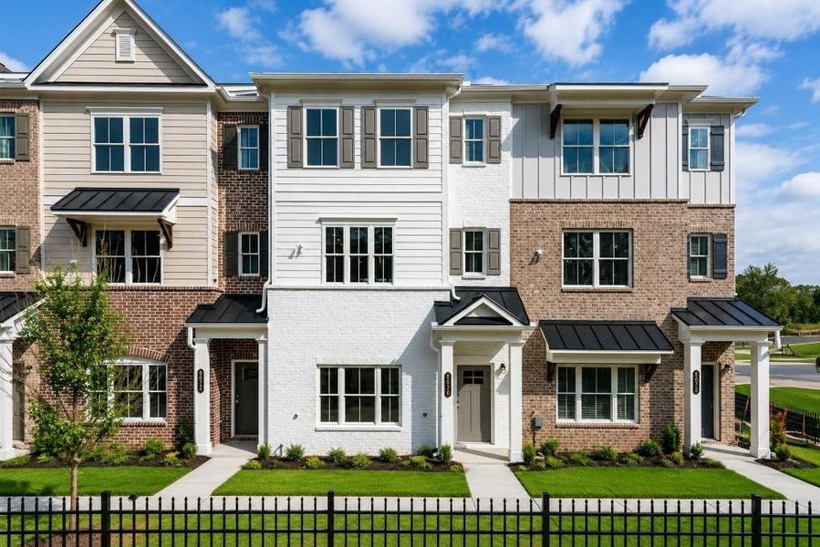 Front exterior of a new home in Wilkins Walk, Mableton, GA, highlighting curb appeal (Image 2). Front exterior of a new home in Wilkins Walk, Mableton, GA, highlighting curb appeal (Image 2).