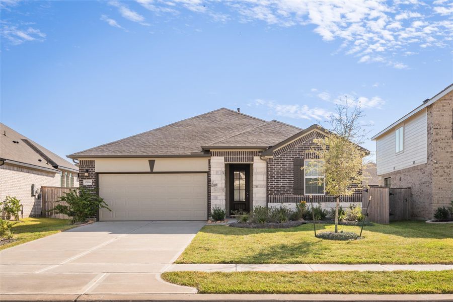 Front exterior of a new home in Dellrose, Hockley, TX, highlighting curb appeal (Image 1). Front exterior of a new home in Dellrose, Hockley, TX, highlighting curb appeal (Image 1).