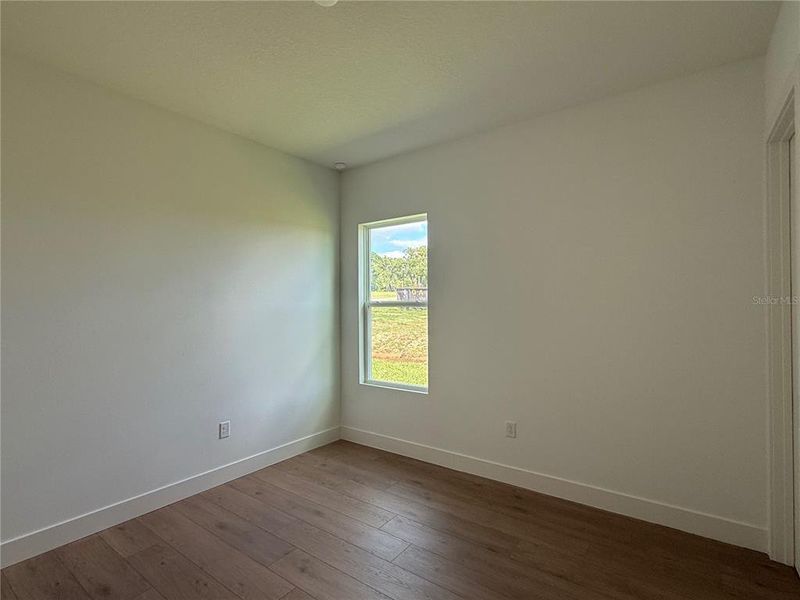 Spacious, unfurnished interior of a new home in West Hill Estates, Dade City (Image 23).