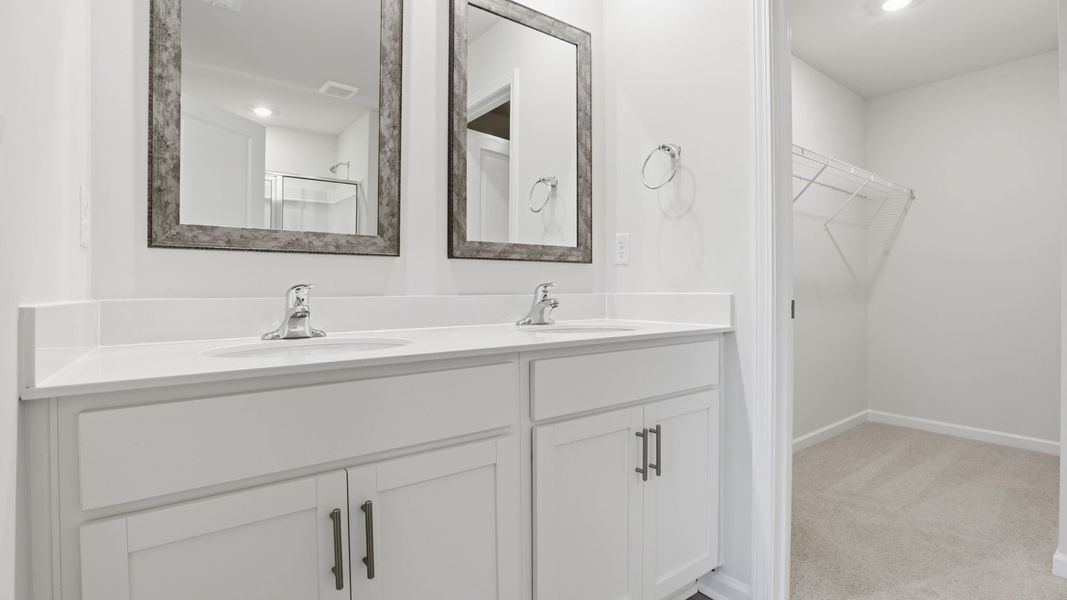 Furnished interior view inside a new home in Bentley Park, Greenwood (Image 12).