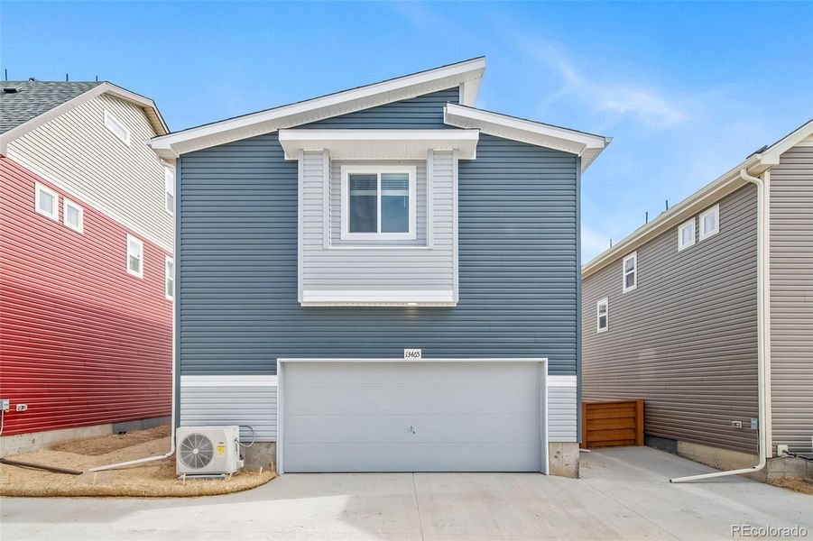 Front exterior of a new home in , Bennett, CO, highlighting curb appeal (Image 18).