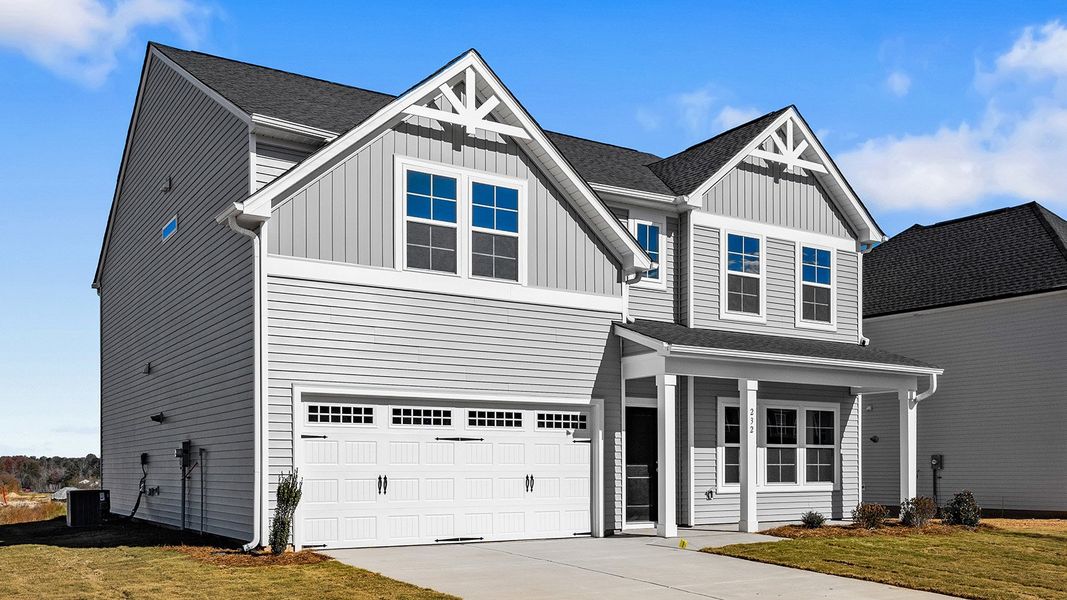 Front exterior of a new home in Fieldstone, Lexington, NC, highlighting curb appeal (Image 2).