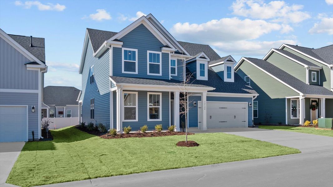 First-rate curb appeal with clean lines and a welcoming front entry First-rate curb appeal with clean lines and a welcoming front entry