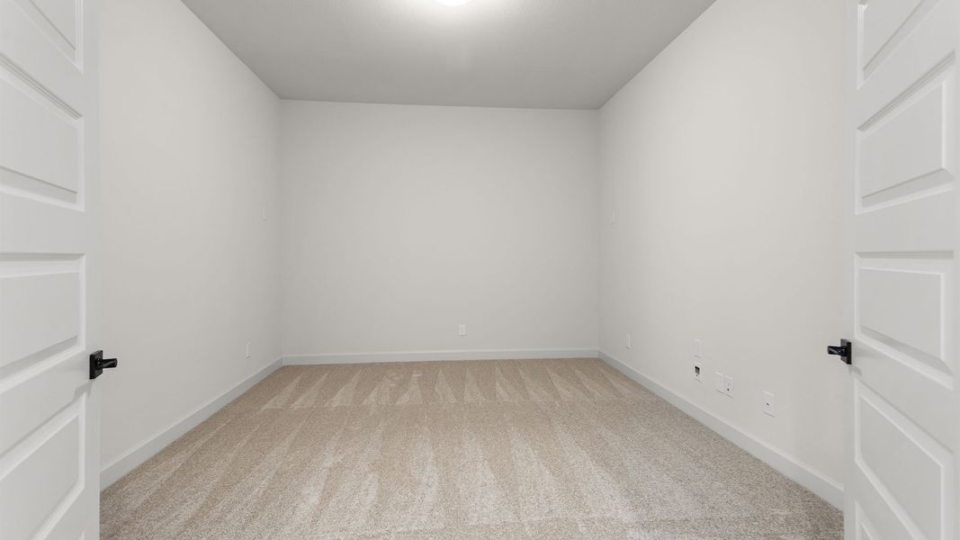 Spacious, unfurnished interior of a new home in Meridiana, Manvel (Image 18).