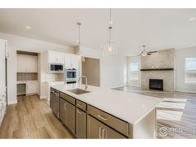 Furnished interior view inside a new home in RainDance National 60/70, Windsor (Image 7).
