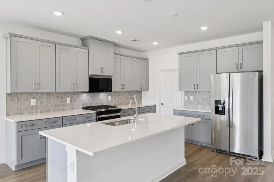 Photo is not of the actual home, but is an inspirational photo of builder’s model home and may depict options, furnishings, and/or decorator features that are not included