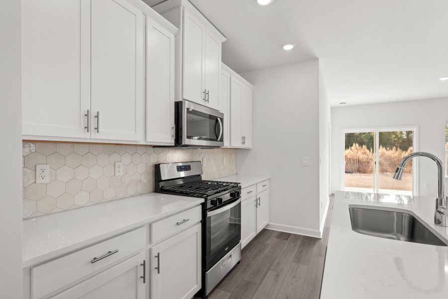 Furnished interior view inside a new home in Cypress Ridge - The Boardwalk Series, Longs (Image 8).
