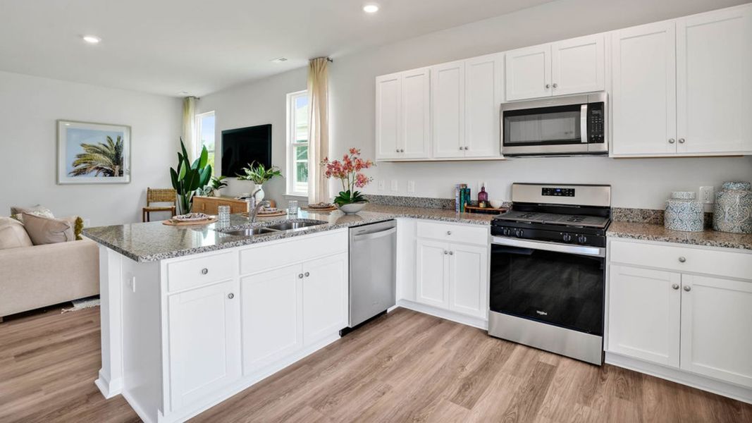 Representative furnished interior of a home built from the LEWIS by D.R. Horton in The Cottages at Blake Farm, Wilmington (Image 22).