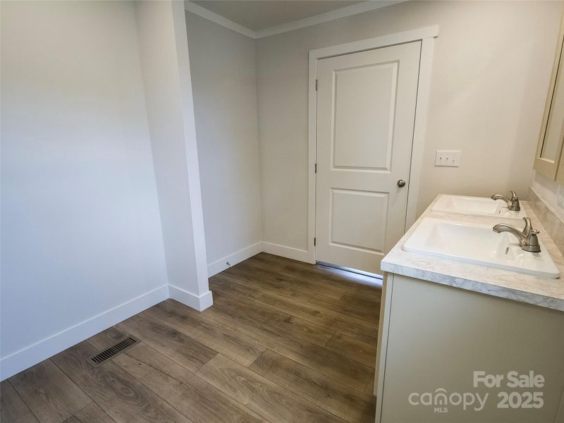 Space for built in shelving in Primary Bathroom