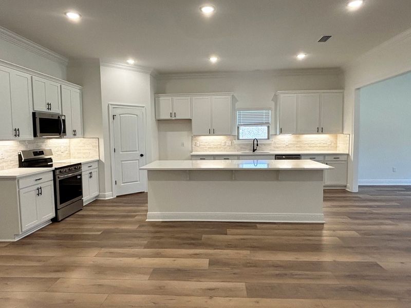 Furnished interior view inside a new home in Young Oaks, Crestview (Image 6).