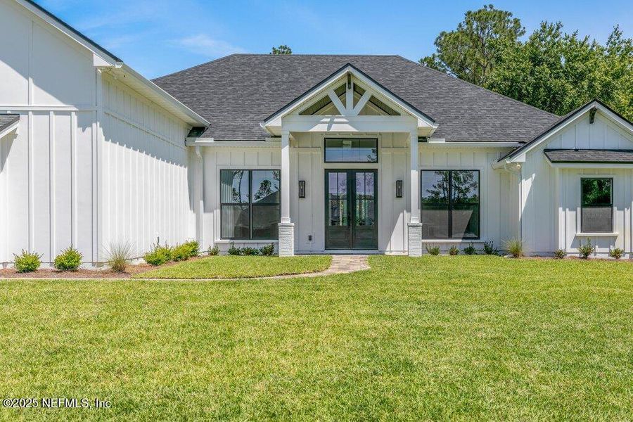 Front exterior of a new home in , Jacksonville, FL, highlighting curb appeal (Image 26).