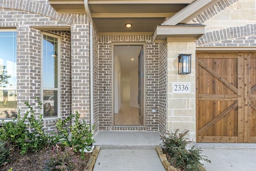 Exterior details and patio area of a home in Stone River Glen 50s, Royse City (Image 25). Exterior details and patio area of a home in Stone River Glen 50s, Royse City (Image 25).