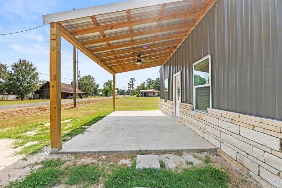 Exterior details and patio area of a home in , Point Blank (Image 3).