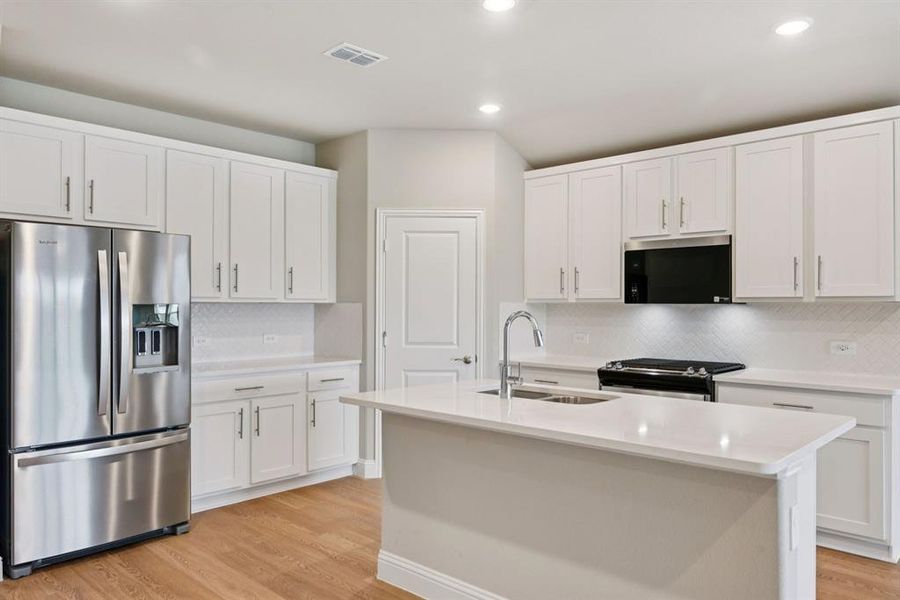 Photo is not of the actual home, but is an inspirational photo of builder’s model home and may depict options, furnishings, and/or decorator features that are not included.