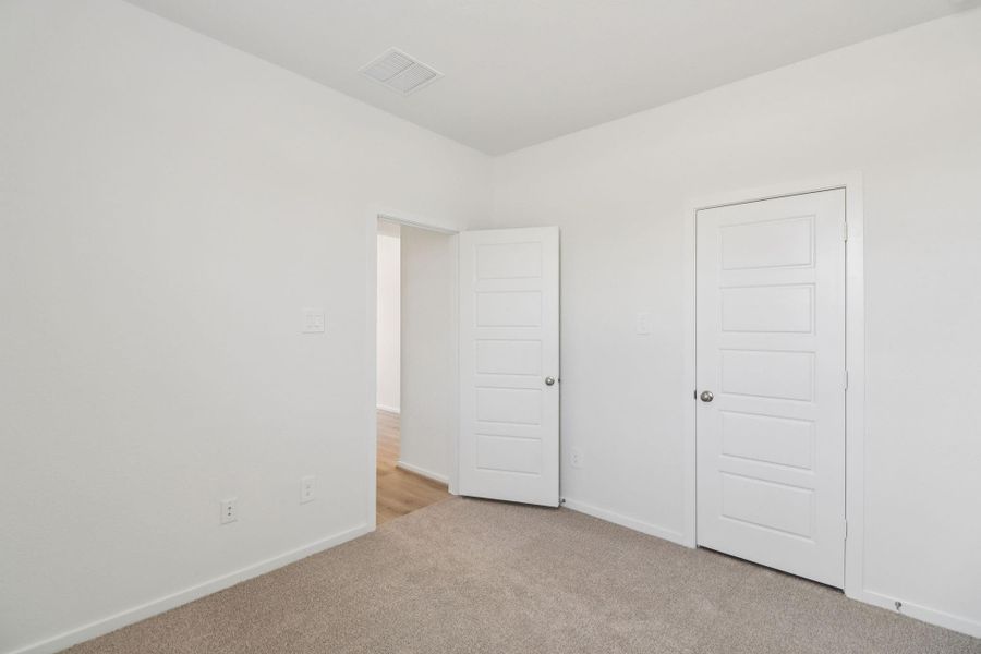 Spacious, unfurnished interior of a new home in Landing Meadows - Premier Series, New Caney (Image 22). Spacious, unfurnished interior of a new home in Landing Meadows - Premier Series, New Caney (Image 22).