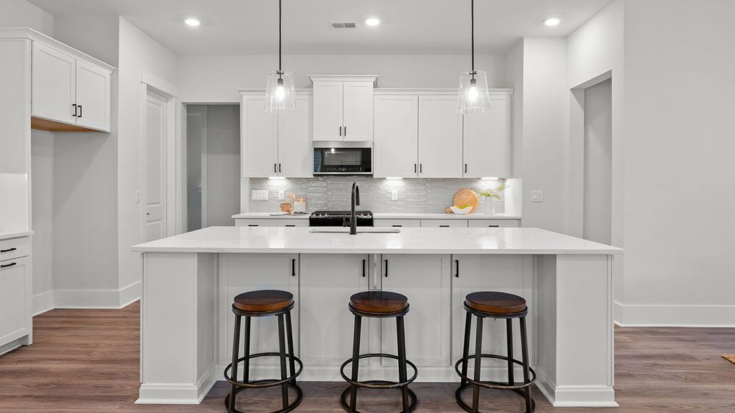 Furnished interior view inside a new home in Summerwind Crossing at Lakes of Cane Bay, Summerville (Image 7).