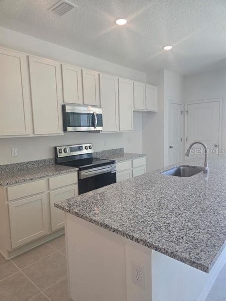 Furnished interior view inside a new home in Delaney Reserve, Deland (Image 49).