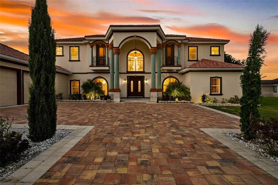 Front exterior of a new home in , Thonotosassa, FL, highlighting curb appeal (Image 1). Front exterior of a new home in , Thonotosassa, FL, highlighting curb appeal (Image 1).