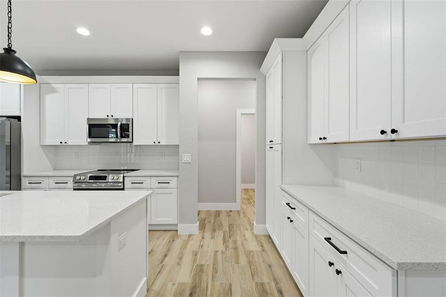 Furnished interior view inside a new home in , Port Charlotte (Image 9).