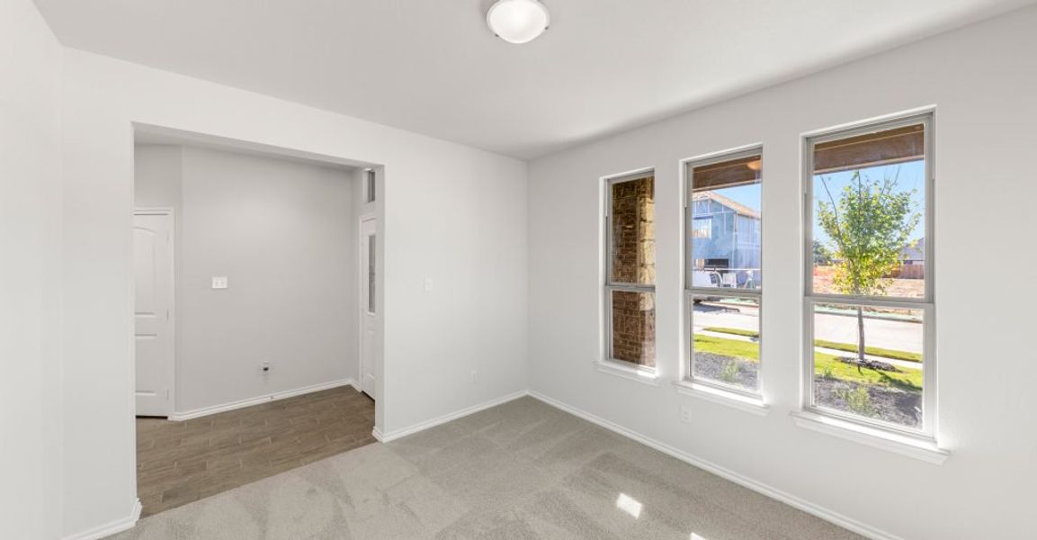 Representative exterior photo of a completed home built from the Raleigh by Impression Homes in ValleyBrooke, Mesquite, TX (Image 10).