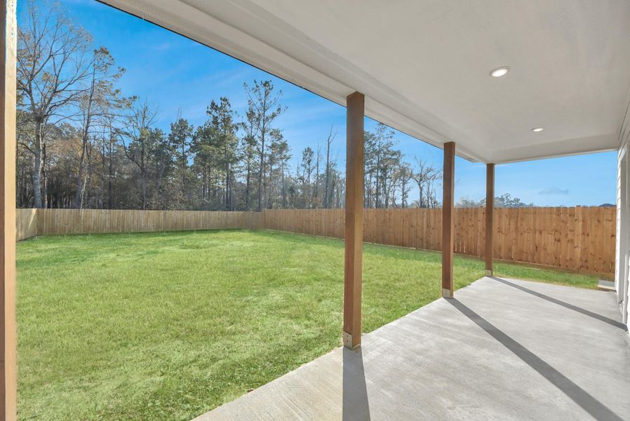 Exterior details and patio area of a home in , Conroe (Image 23).