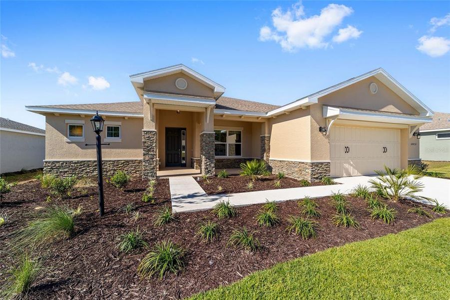 Front exterior of a new home in , Ocala, FL, highlighting curb appeal (Image 19). Front exterior of a new home in , Ocala, FL, highlighting curb appeal (Image 19).