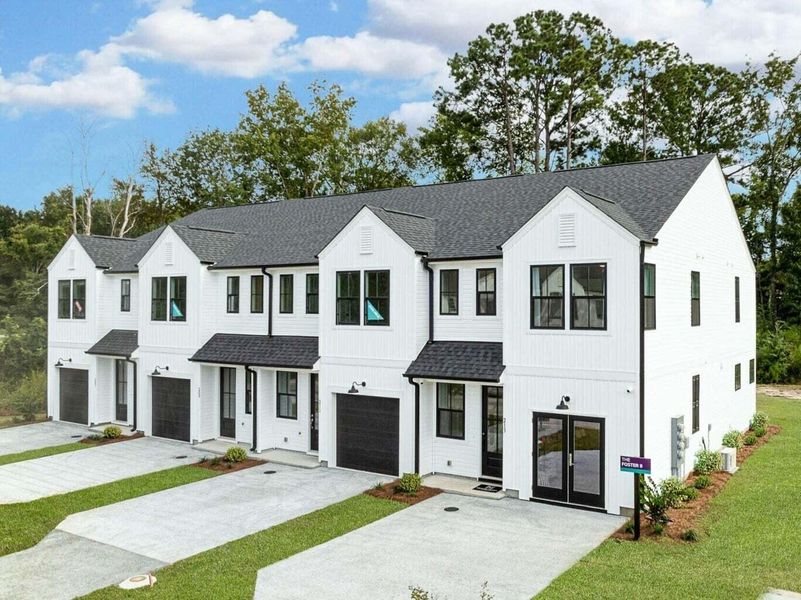 Front exterior of a new home in Founder's Park, Lincolnville, SC, highlighting curb appeal (Image 1). Front exterior of a new home in Founder's Park, Lincolnville, SC, highlighting curb appeal (Image 1).