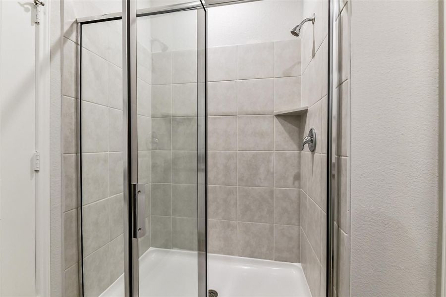 Furnished interior view inside a new home in Caney Creek Place, Conroe (Image 74).