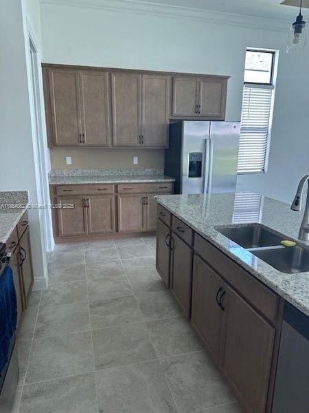 Furnished interior view inside a new home in , Port St. Lucie (Image 2).