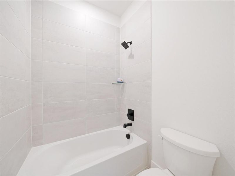 Furnished interior view inside a new home in Royal Court, Little Elm (Image 28).