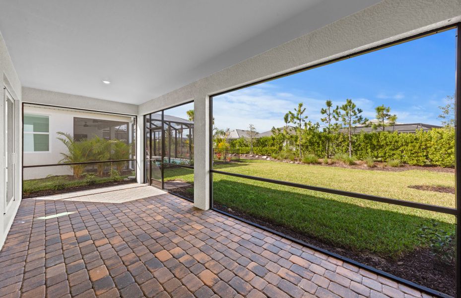 Exterior details and patio area of a home in Del Webb Oak Creek, North Fort Myers (Image 3).
