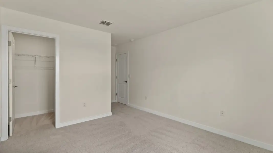 The Naples Second Floor Second Bedroom in Quick Move-In Home at Willowbrook North by DRB Homes in Winter Haven, FL