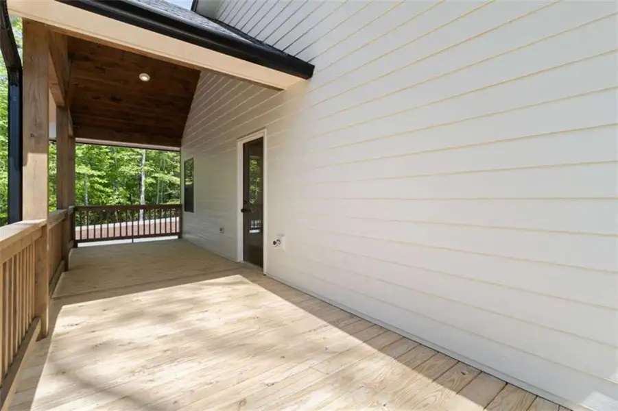 Exterior details and patio area of a home in , Ellijay (Image 30).