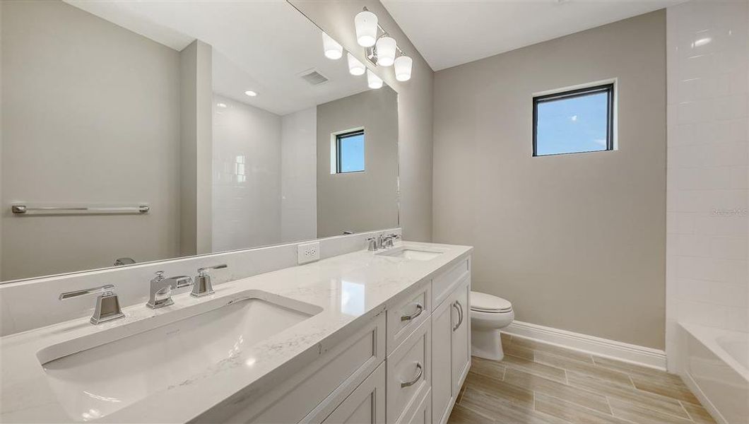 Furnished interior view inside a new home in Palm Grove, Lakewood Ranch (Image 9). Furnished interior view inside a new home in Palm Grove, Lakewood Ranch (Image 9).