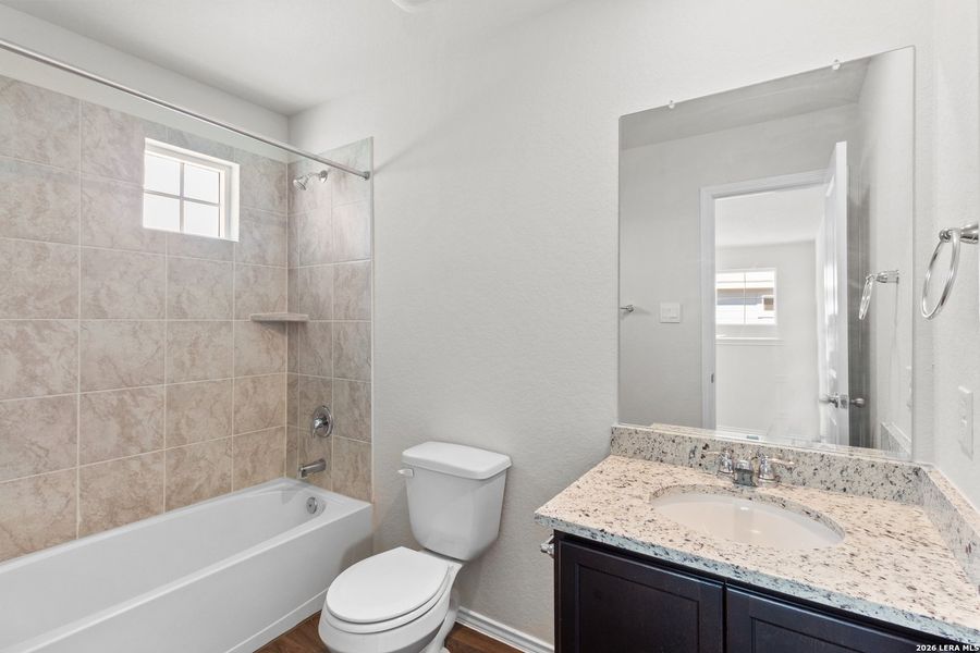Furnished interior view inside a new home in Redbird Ranch, San Antonio (Image 16).