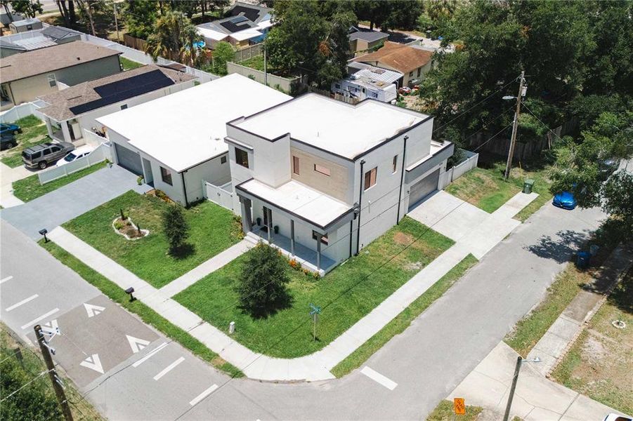 Front exterior of a new home in , Tampa, FL, highlighting curb appeal (Image 10).