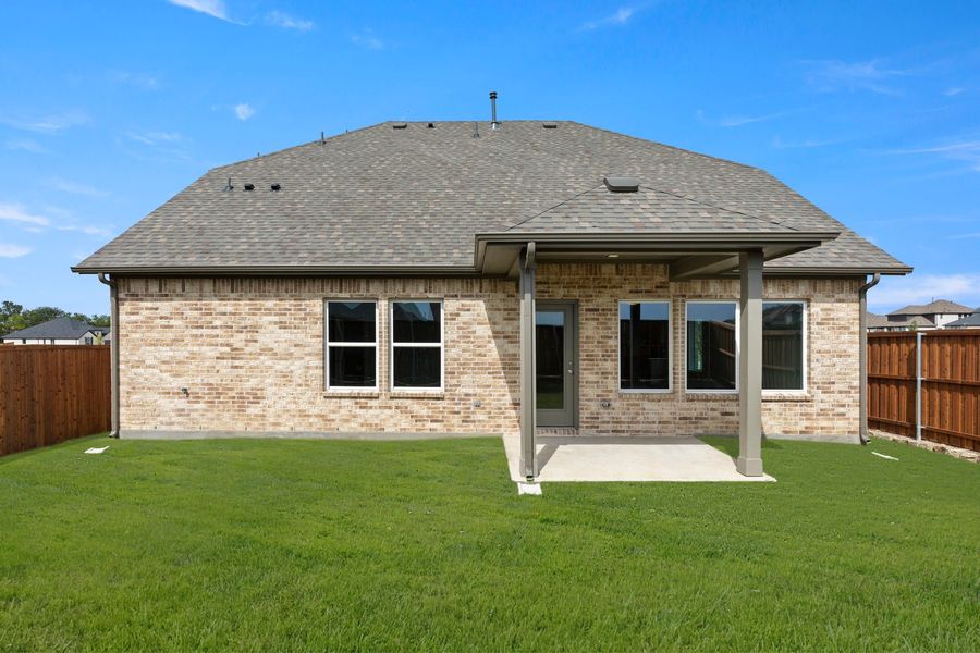 Exterior details and patio area of a home in Creekside, Royse City (Image 3).