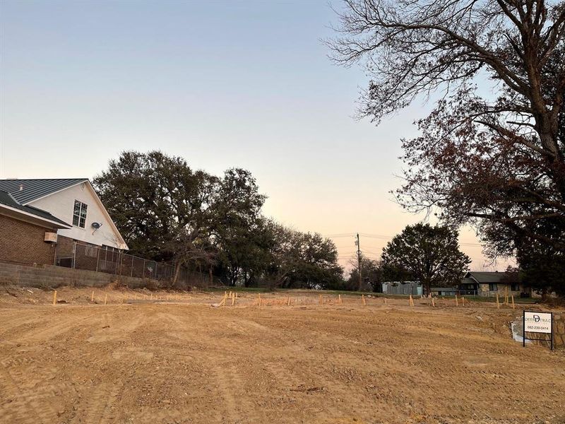 View of yard at dusk