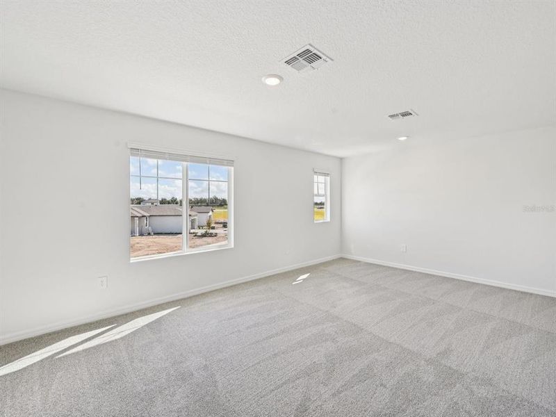 Spacious, unfurnished interior of a new home in Oakfield Trails - Premier Series, Parrish (Image 6).