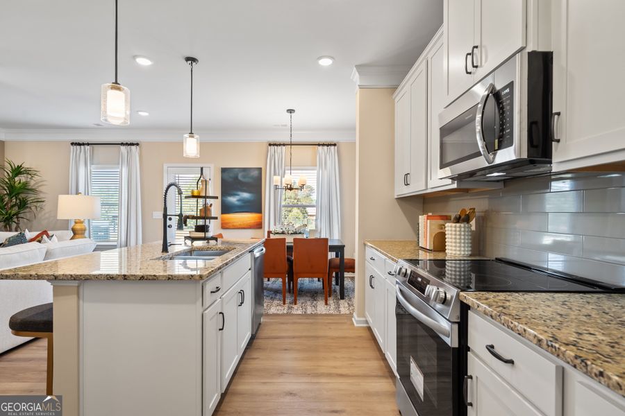 Furnished interior view inside a new home in Crescent Towns, Riverdale (Image 8).