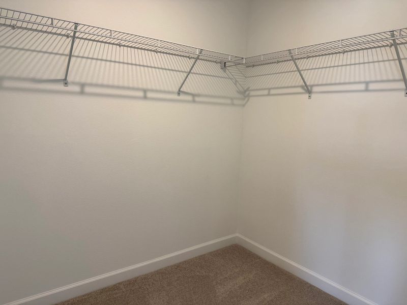 Vast primary walk-in closet