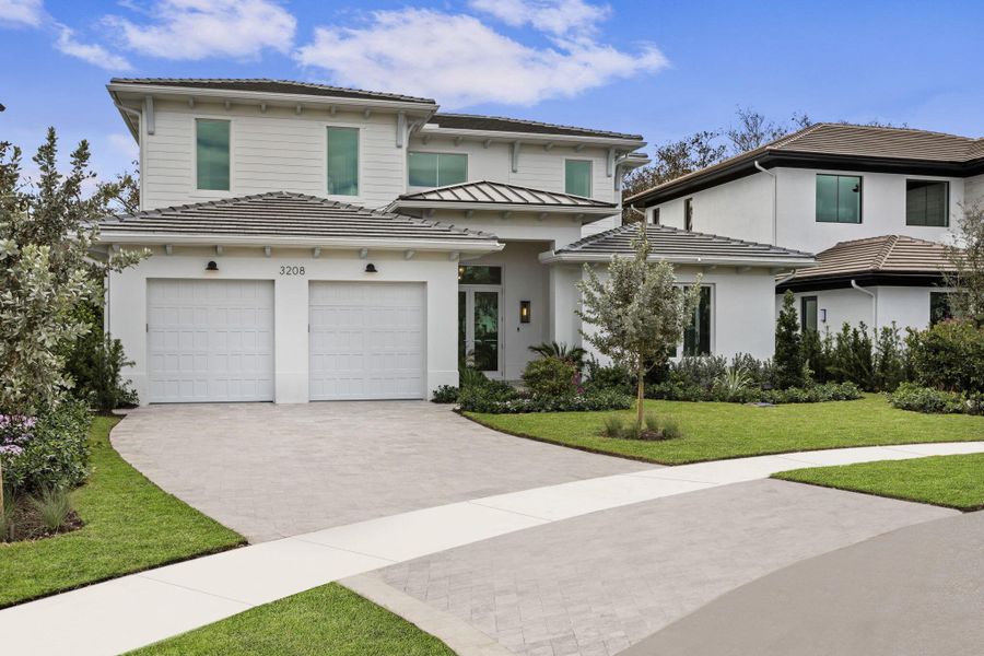 Front exterior of a new home in , Wellington, FL, highlighting curb appeal (Image 1).