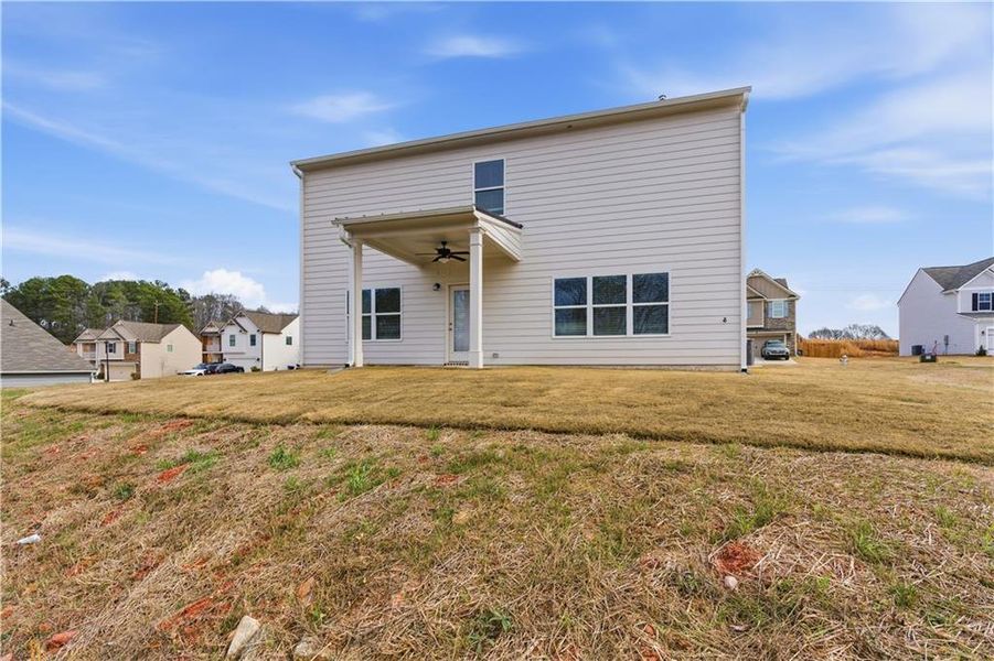Exterior details and patio area of a home in The Reserve at Chapel Hill Phase II, Douglasville (Image 21).