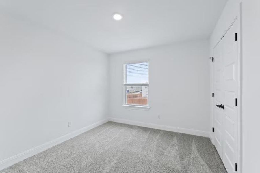 Photo of Pulte model home with same floor plan, not of actual home listed.