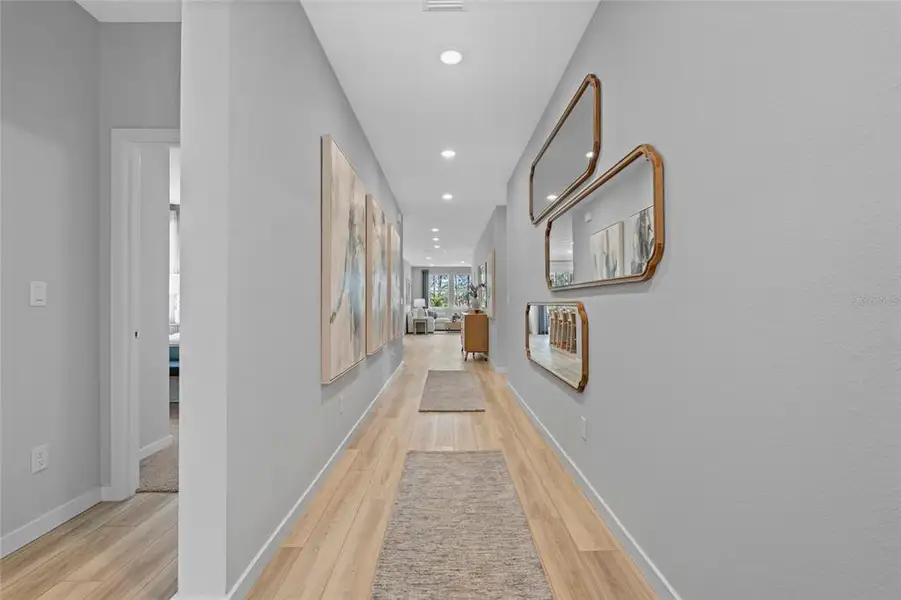 Furnished interior view inside a new home in The Magnolia Series at Reserve East, Flagler Beach (Image 3).