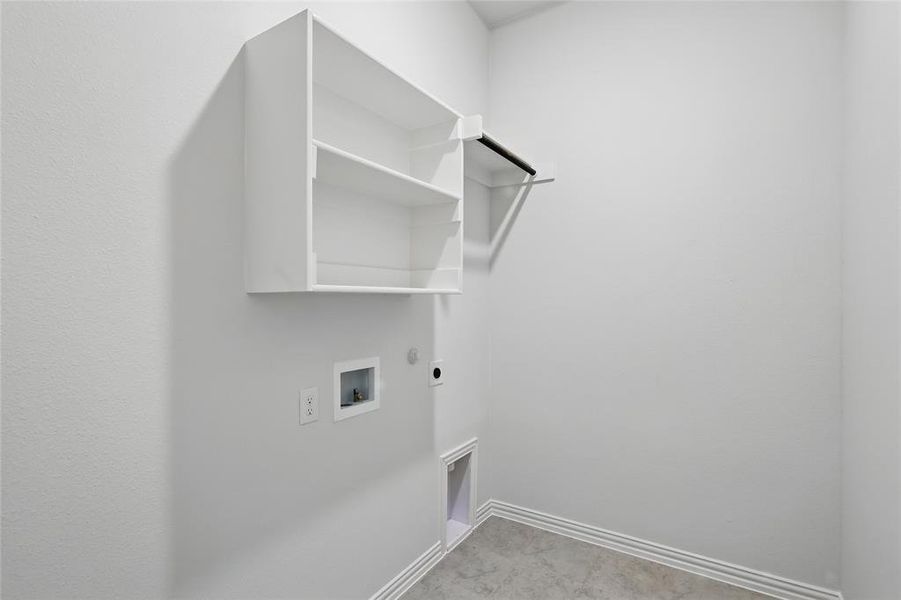 Washroom with washer hookup, laundry area, electric dryer hookup, hookup for a gas dryer, and baseboards Washroom with washer hookup, laundry area, electric dryer hookup, hookup for a gas dryer, and baseboards