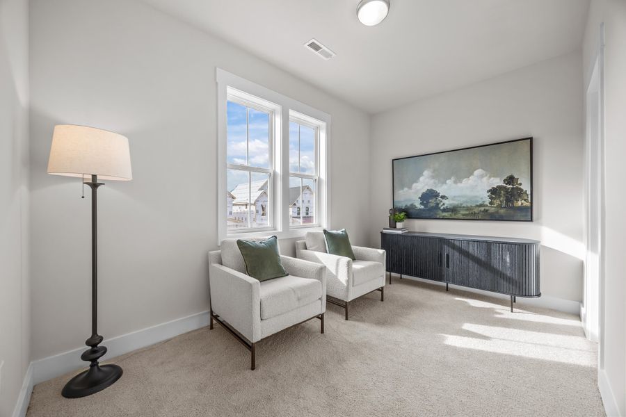 Representative furnished interior of a home built from the Southbound Train by Garman Homes in Wendell Falls, Wendell (Image 12).