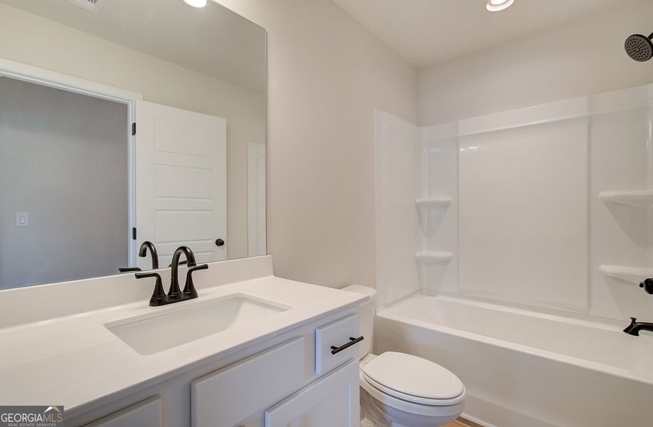 Furnished interior view inside a new home in Rosewood Lake Preserve, Hoschton (Image 11). Furnished interior view inside a new home in Rosewood Lake Preserve, Hoschton (Image 11).