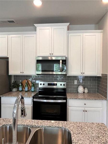 Furnished interior view inside a new home in Reeves Park, Stockbridge (Image 6).