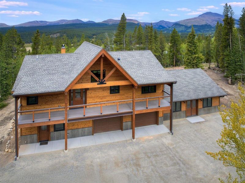 Front exterior of a new home in , Fairplay, CO, highlighting curb appeal (Image 24).